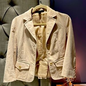 Beige jacket.